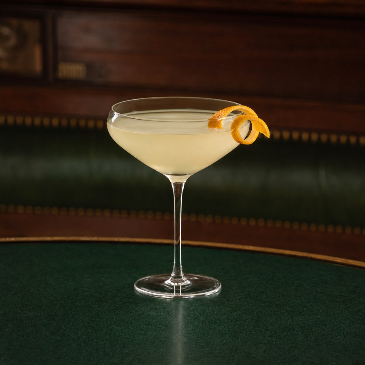 Corpse Reviver No. 2 cocktail served in a absinthe-rinsed coupe with optional orange twist