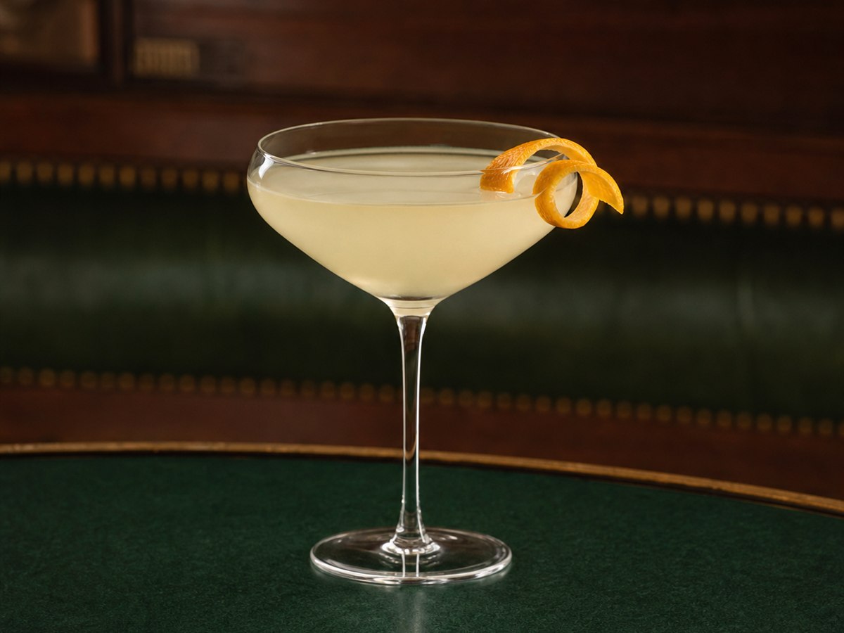 Corpse Reviver No. 2 cocktail served in a absinthe-rinsed coupe with optional orange twist