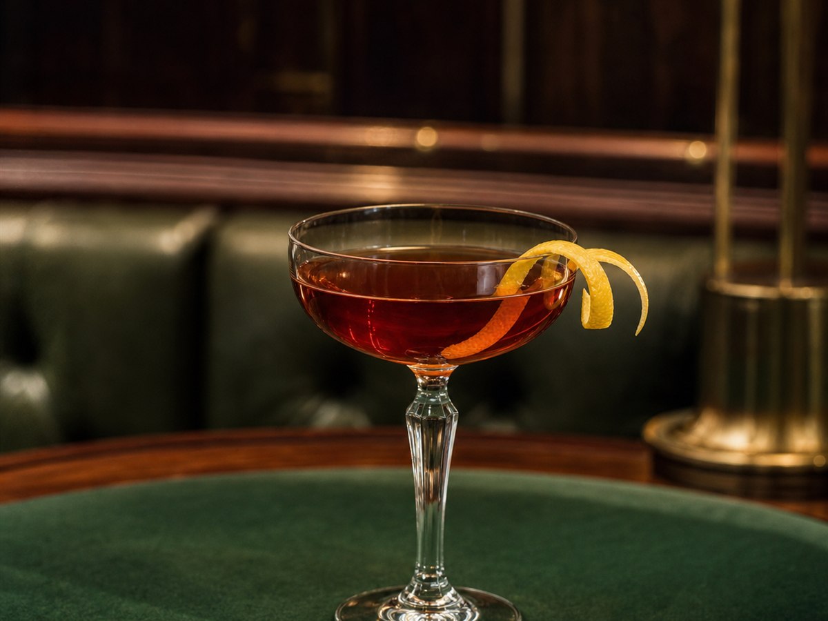 Martinez cocktail served in a chilled coupe with lemon twist