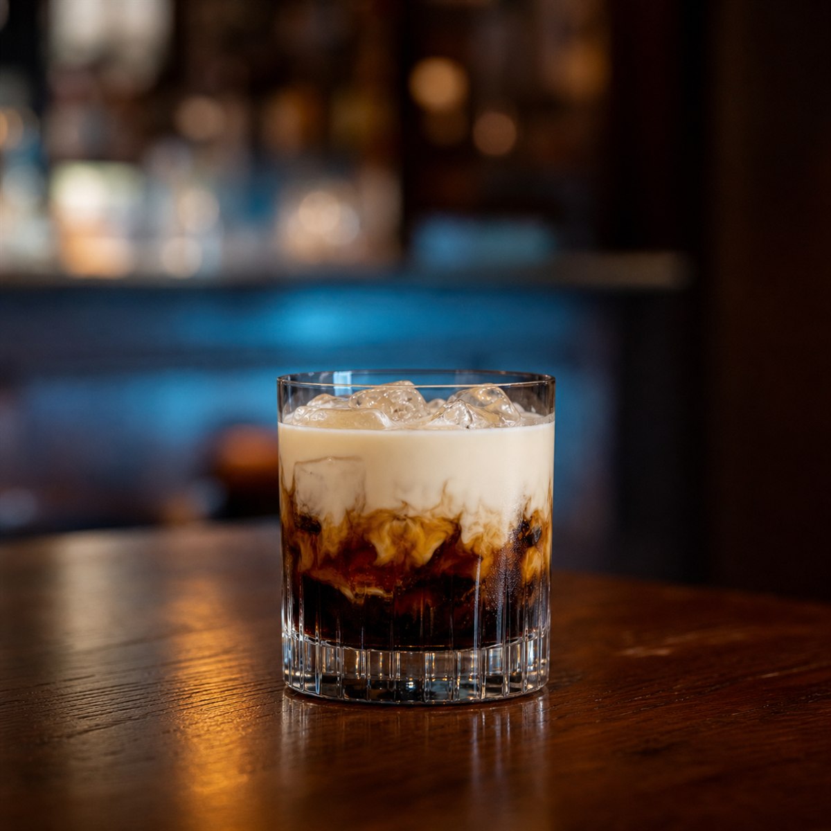 White Russian cocktail served in a rocks glass with none